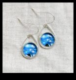 Mirdzošā galaktika Spīduma piedzīvojums ceļu mūsu galaktikas auskariem